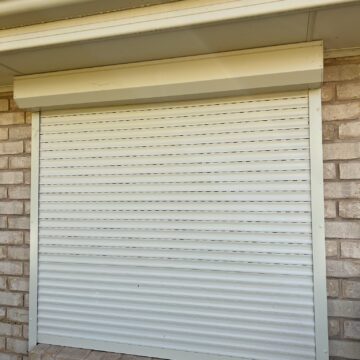 spring loaded roller shutter