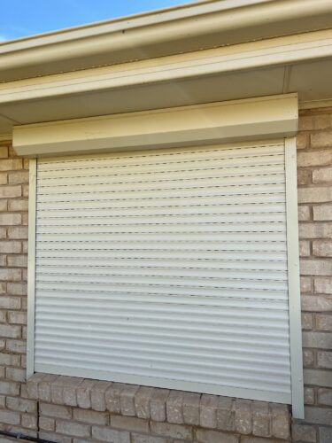 spring loaded roller shutter